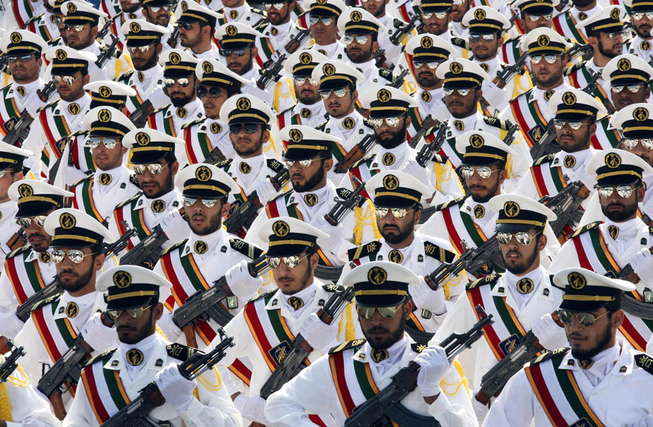 EDITORS' NOTE: Reuters and other foreign media are subject to Iranian restrictions on their ability to report, film or take pictures in Tehran. Members of the Iranian Revolutionary Guard Navy march during a parade to commemorate the anniversary of the Iran-Iraq war (1980-88), in Tehran September 22, 2011. REUTERS/Stringer (IRAN - Tags: POLITICS MILITARY ANNIVERSARY)