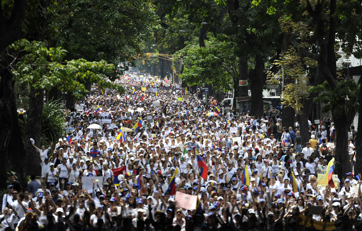 Акция протеста в Каракасе, 26 февраля 2014. © Leo Ramirez | AFP | Getty Images