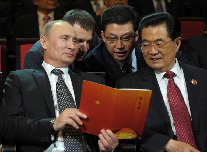 Владимир Путин и чиновники из Китая © Алексей Дружинин РИА Новости