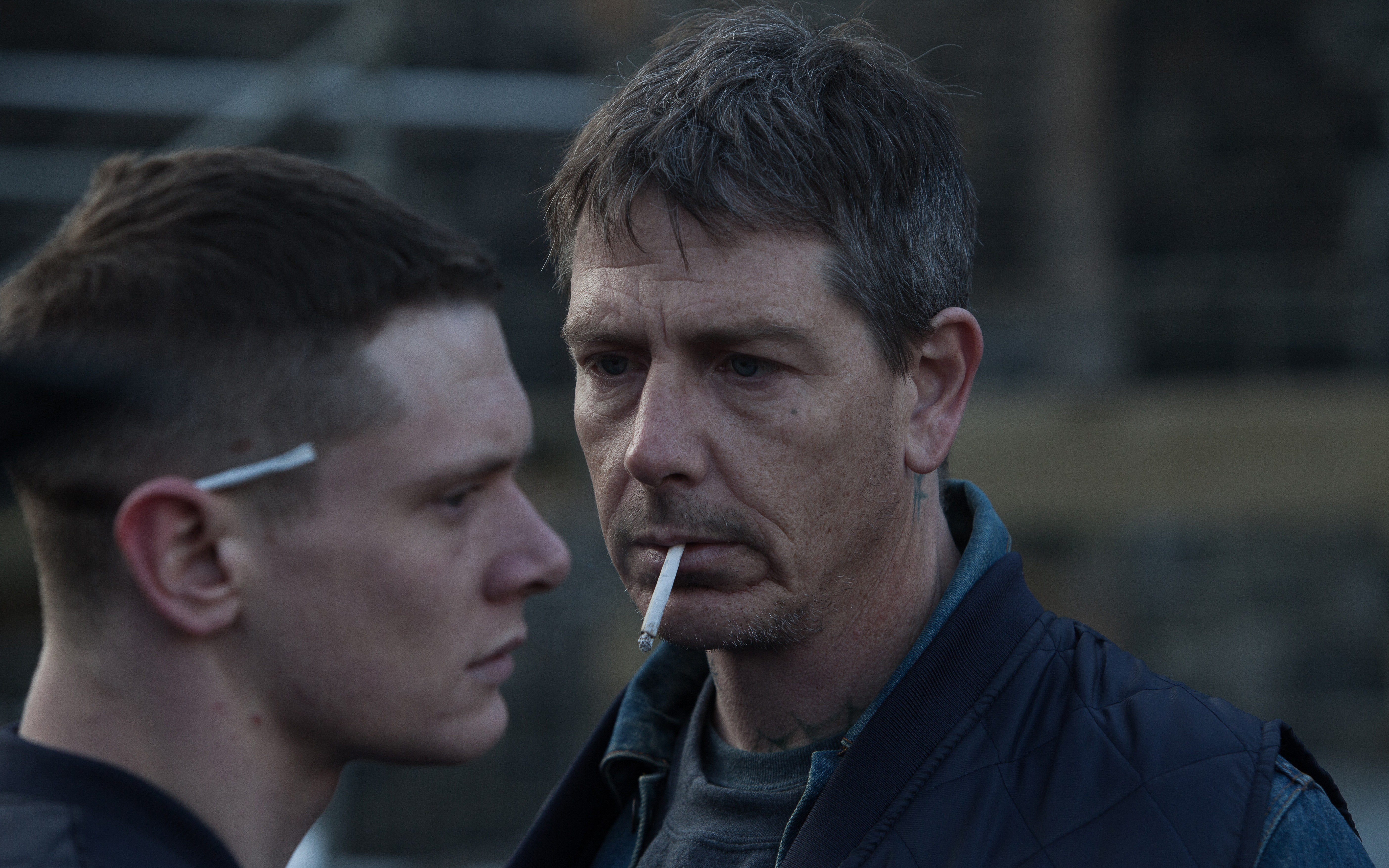 -Jack O Connell playing Eric and Ben Mendelsohn playing Neville