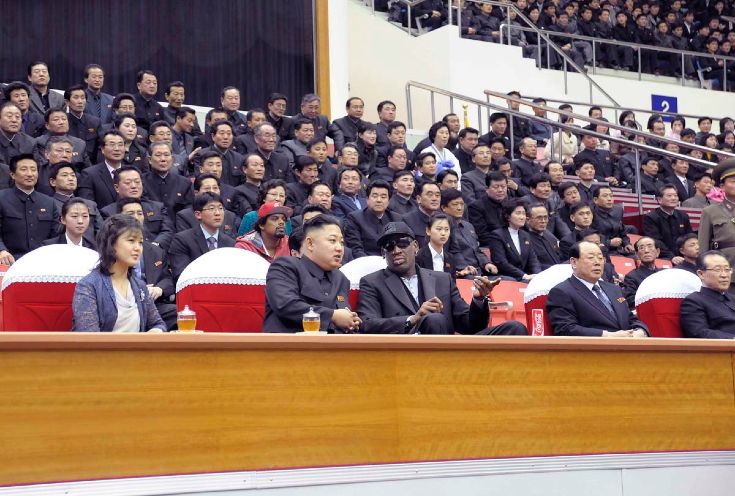 North Korean leader Kim Jong-Un, his wife Ri Sol-Ju and former NBA basketball player Dennis Rodman watch an exhibition basketball game in Pyongyang